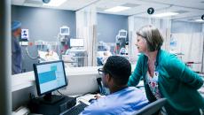 Healthcare workers using a computer