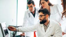 Group of healthcare professionals at a screen