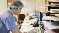 Doctor on computer in hospital