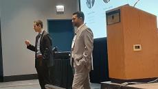 Dr. Frederik Floether, left and Dr. Numan Laanait discuss quantum computing at the HIMSS23 Global Conference in Chicago on Wednesday.