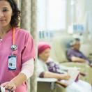 Doctor working in infusion room