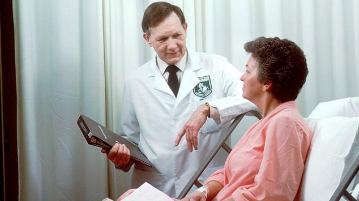 Doctor talking to patient