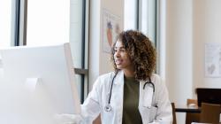 Healthcare worker using computer